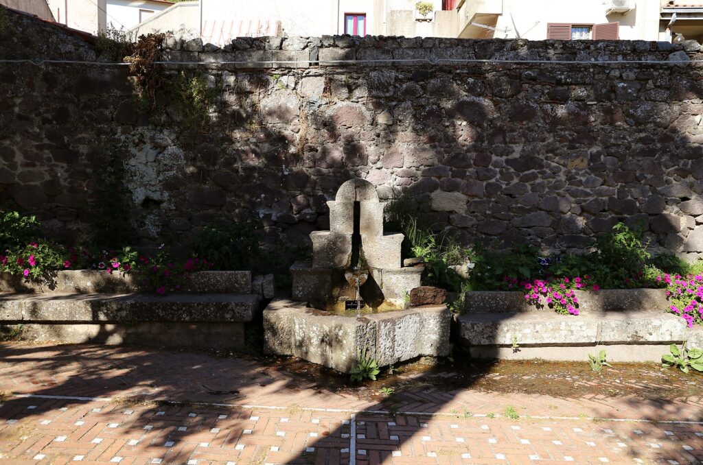 Old stone public fountain in the centre of Santu Lussurgiu