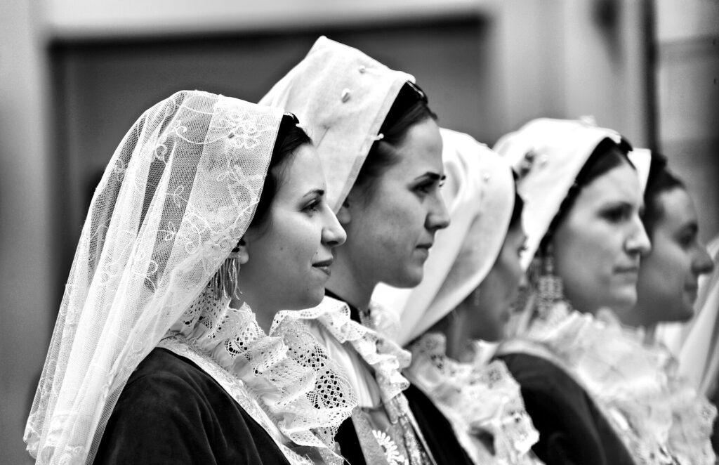 Women wearing the lace veil of the traditional costume at the Sant'Efisio procession