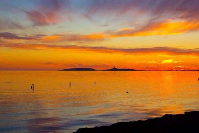 Cena al tramonto in barca a vela davanti a Tharros
